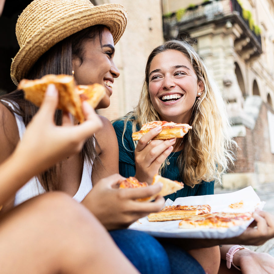 Image_women eating pizza.jpeg